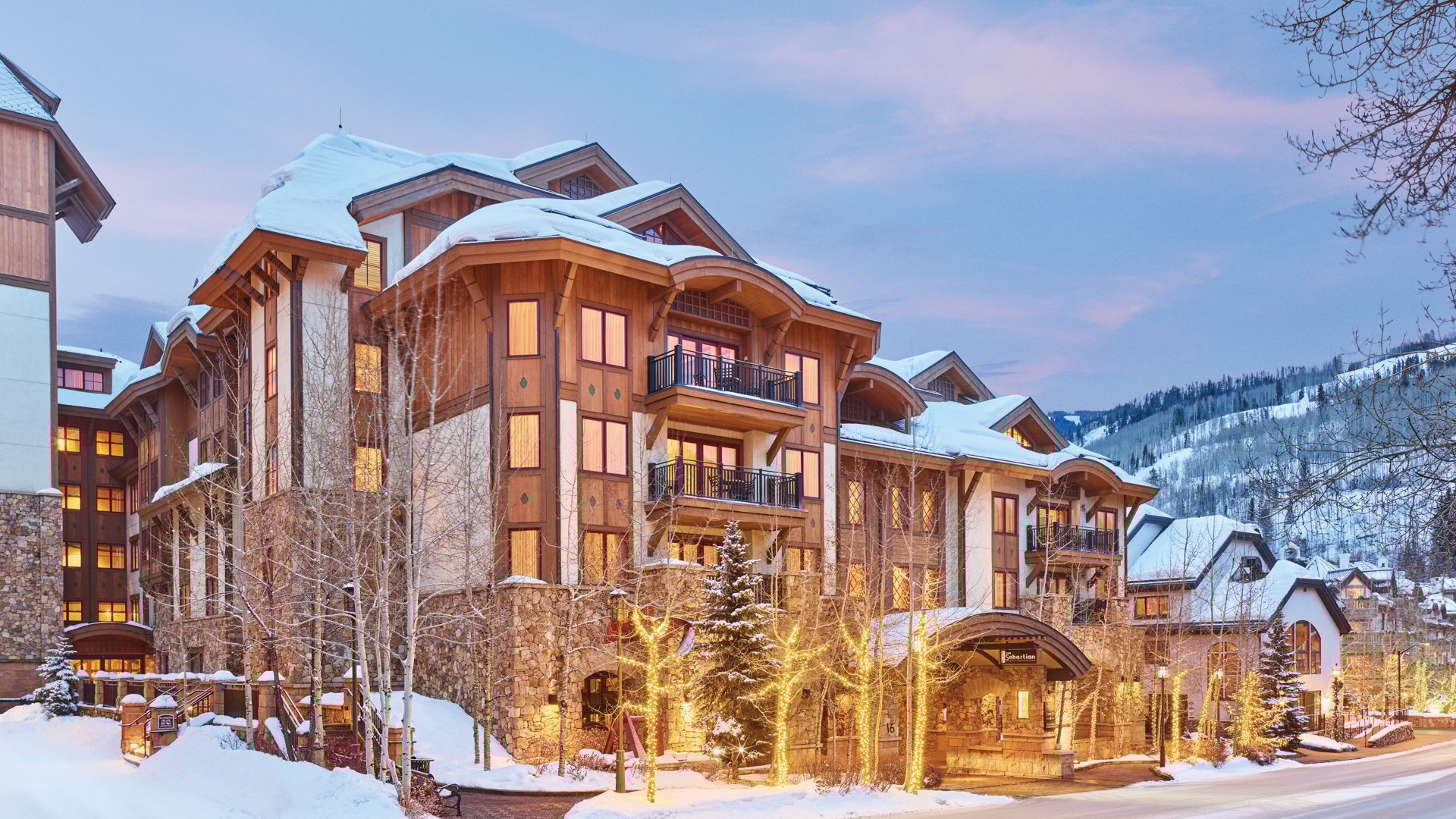 exterior shot of The Sebastian - Vail hotel portico in winter